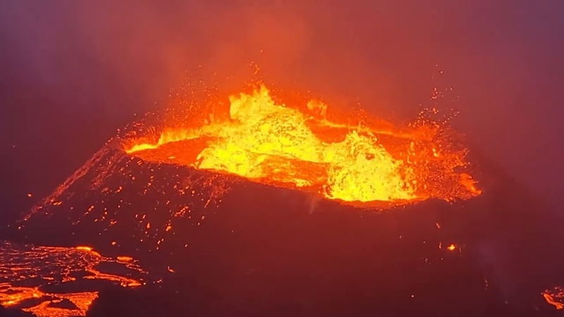 Choking volcano overspilling with lava West exit tube nearly blocked. Dangerous smoke