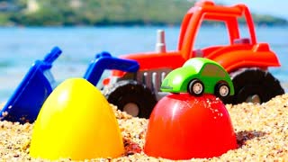 Игры для детей с машинками. Трактор и яйцо с сюрпризом